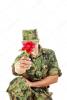 depositphotos_51391933-Soldier-in-camouflage-uniform-kneeling-holding-flower.jpg